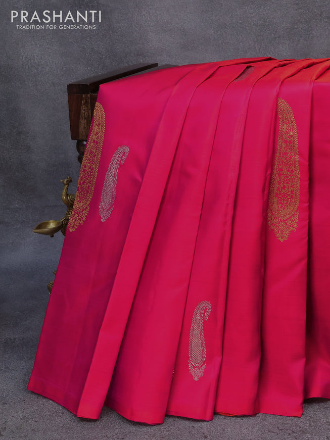 Pure kanjivaram silk saree dual shade of pinkish orange with silver & gold zari woven paisley buttas in borderless style