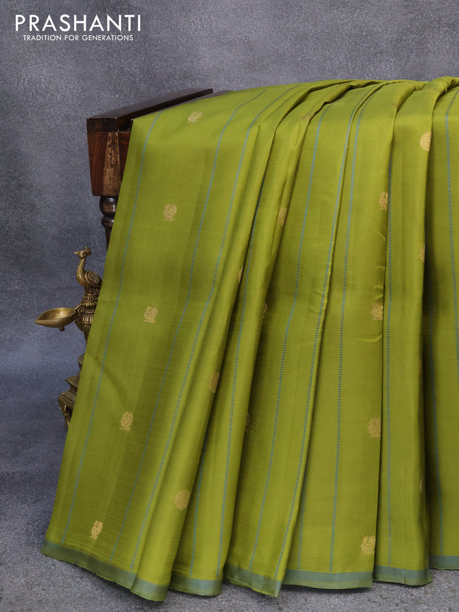 Pure kanjivaram silk saree mehendi green and cs blue with allover annam zari woven buttas and simple border