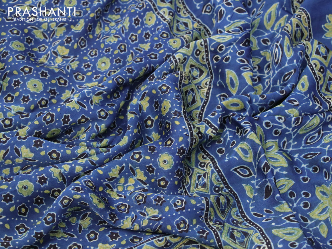 Modal silk saree blue and black with allover floral prints and ajrakh printed pallu