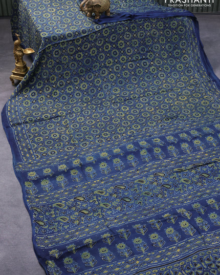 Modal silk saree blue and black with allover floral prints and ajrakh printed pallu