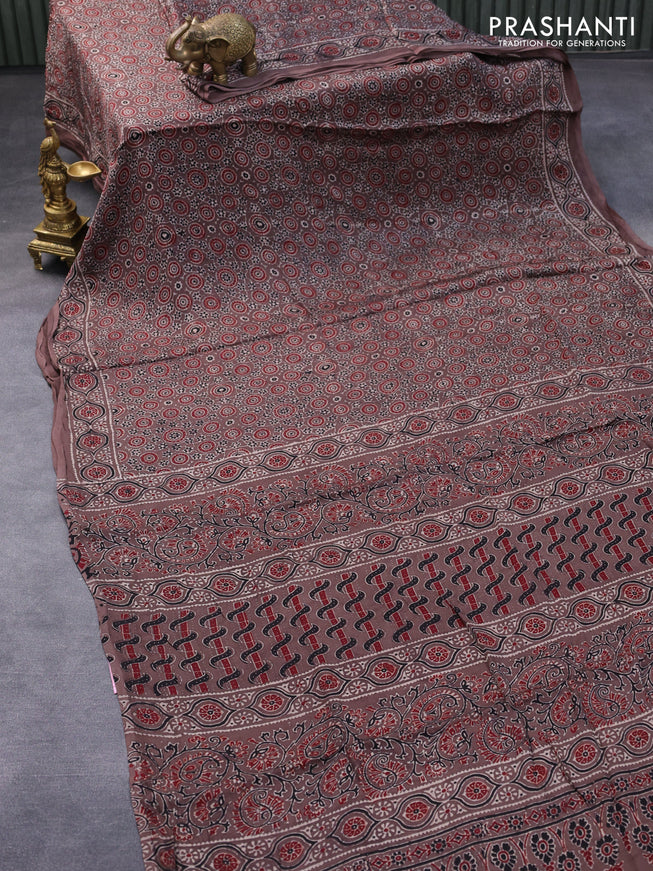 Modal silk saree brown with allover ajrakh prints in borderless style