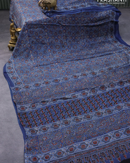 Modal silk saree peacock blue with allover ajrakh prints in borderless style