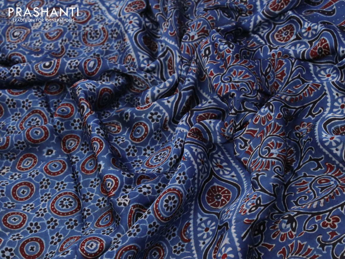 Modal silk saree peacock blue with allover ajrakh prints in borderless style