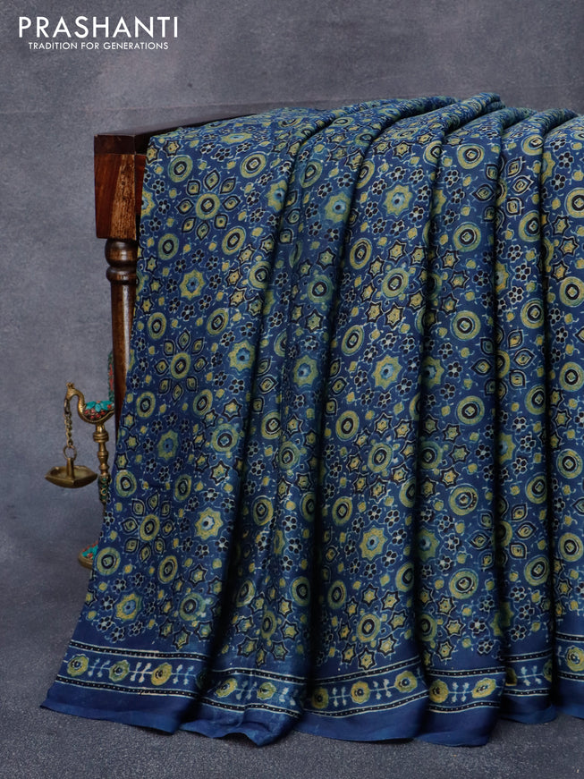 Modal silk saree peacock blue with allover floral prints and ajrakh printed pallu