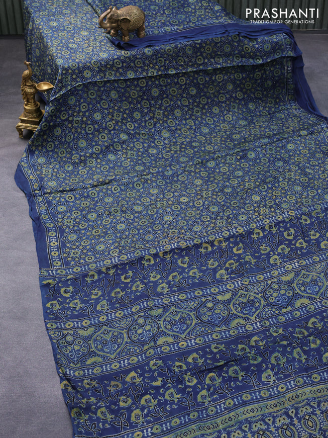 Modal silk saree peacock blue with allover floral prints and ajrakh printed pallu
