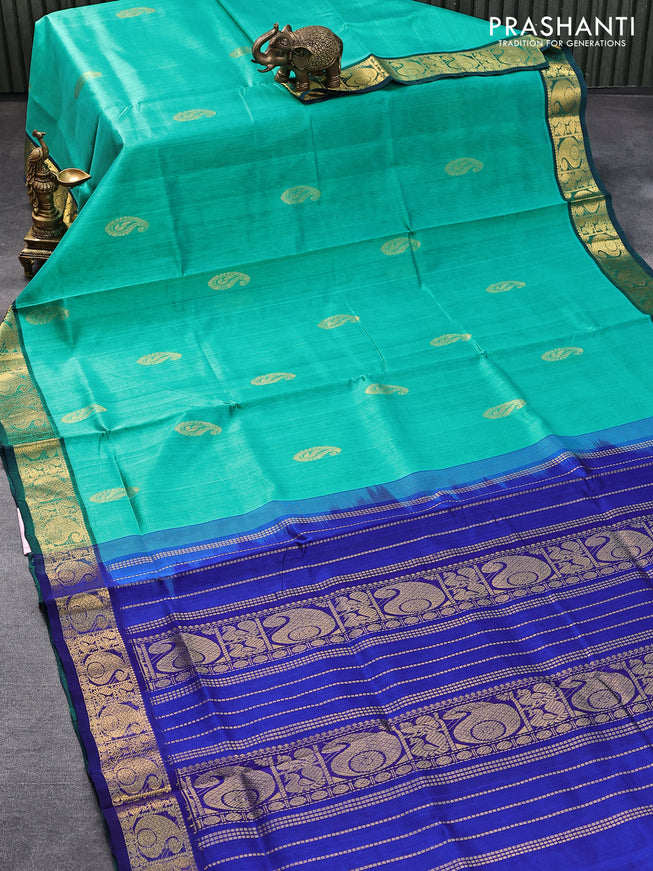 Silk cotton saree teal green and blue with zari woven paisley buttas and annam & paisley zari woven border