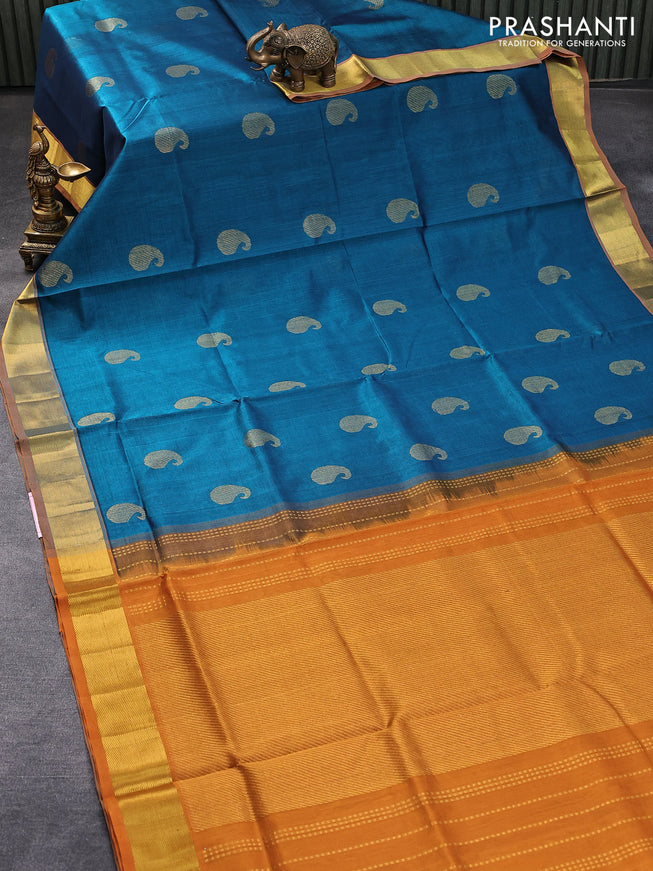 Silk cotton saree peacock blue and dark mustard with zari woven paisley buttas and zari woven border
