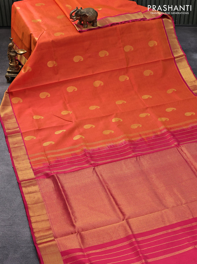 Silk cotton saree dual shade of orange and pink with zari woven paisley buttas and zari woven border