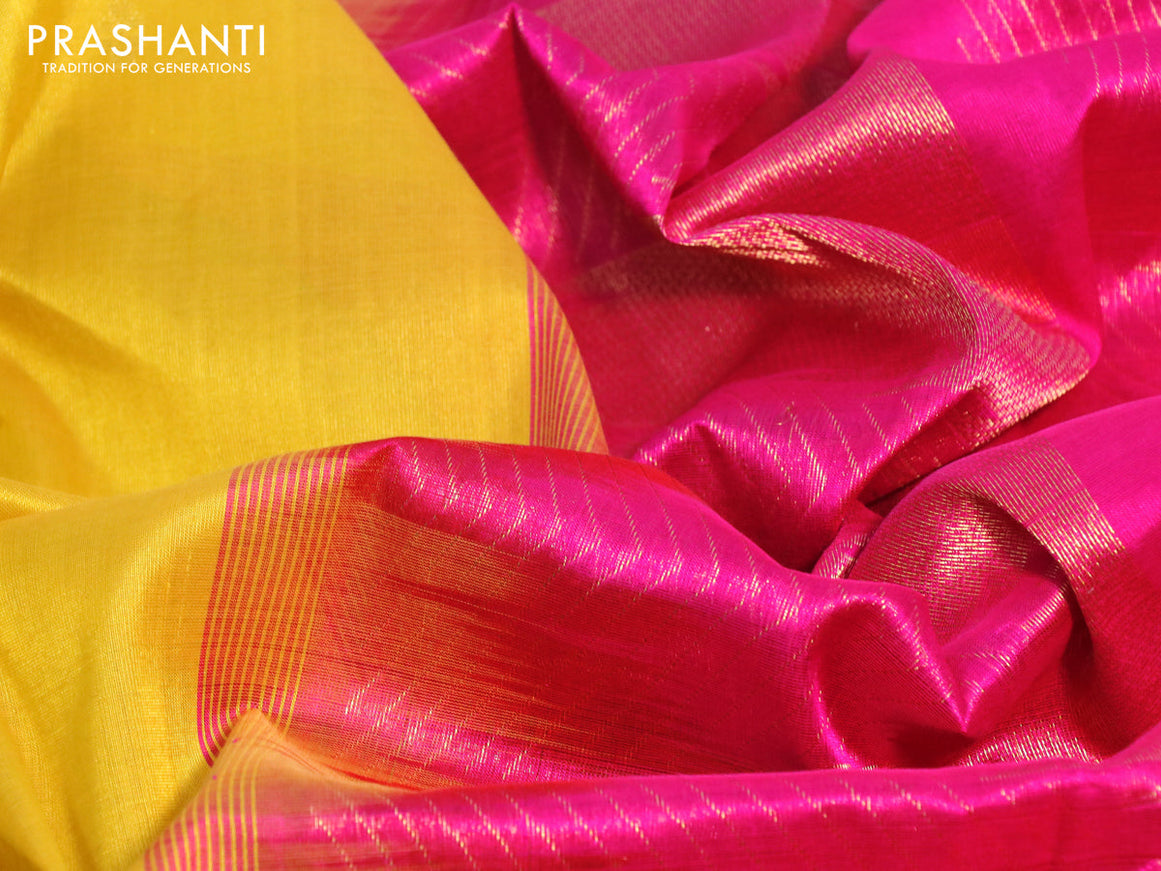 Silk cotton saree yellow and pink with zari woven buttas and temple zari woven border