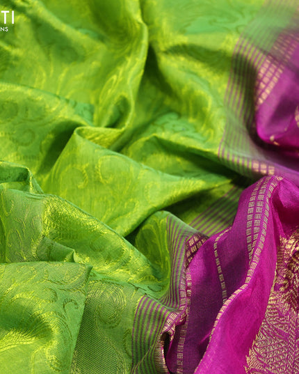Silk cotton saree light green and purple with allover self emboss jaquard and zari woven border