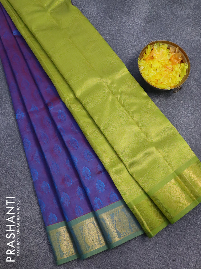 Silk cotton saree dual shade of bluish red and light green with allover self emboss jaquard and peacock zari woven border