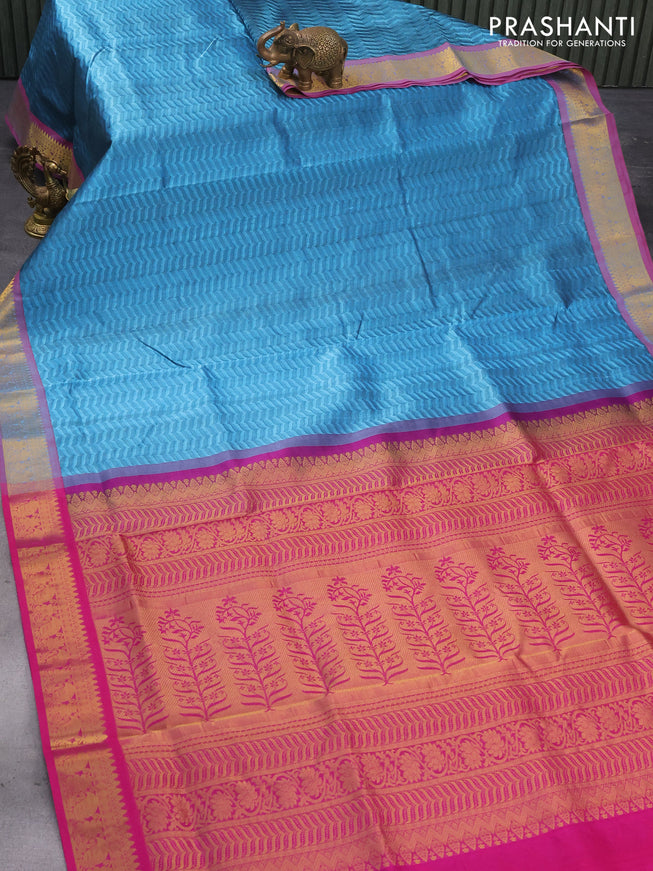 Silk cotton saree blue and pink with allover self emboss jaquard and zari woven border