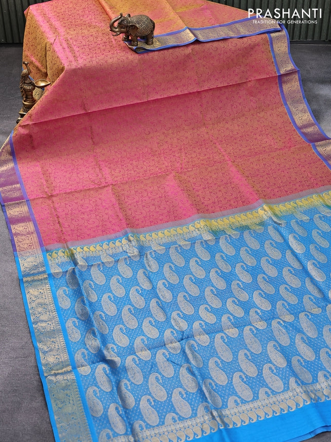 Silk cotton saree dual shade of pinkish yellow and cs blue with allover self emboss jaquard and annam zari woven border