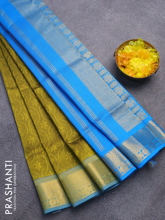 Silk cotton saree olive green and cs blue with allover self emboss jaquard and rich zari woven border