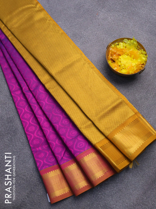 Silk cotton saree purple and mustard yellow with allover self emboss jaquard and rich zari woven border