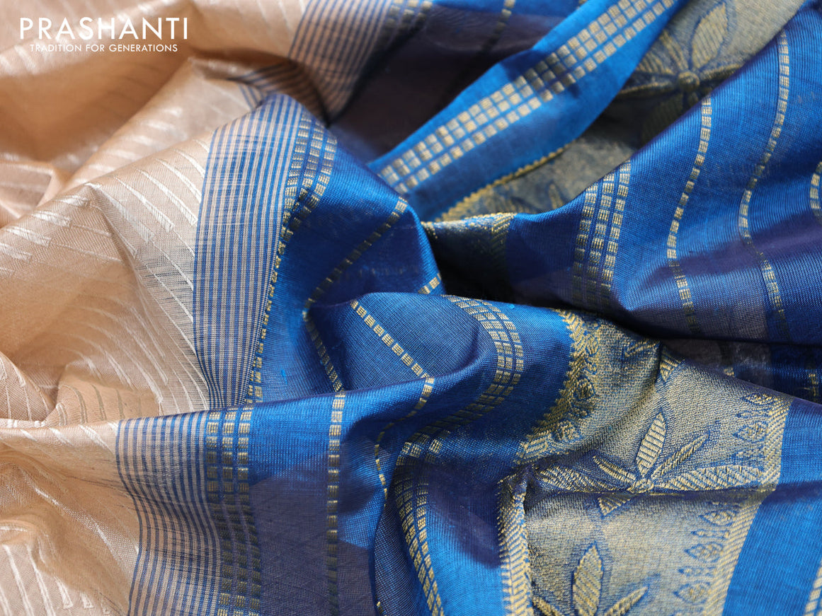 Silk cotton saree beige and peacock blue with allover self emboss jaquard and floral zari woven border