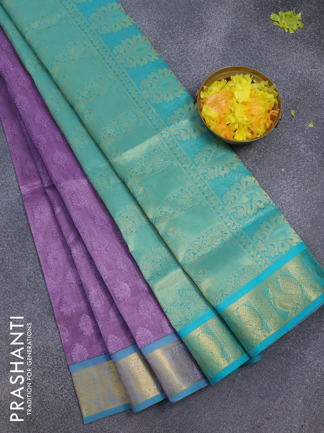 Silk cotton saree mild purple and teal blue with allover self emboss jaquard and annam zari woven border