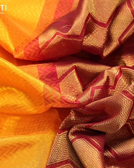 Silk cotton saree mango yellow and maroon with allover self emboss jaquard and zari woven border