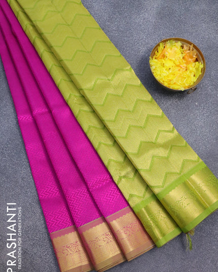 Silk cotton saree magenta pink and light green with allover self emboss jaquard and zari woven border