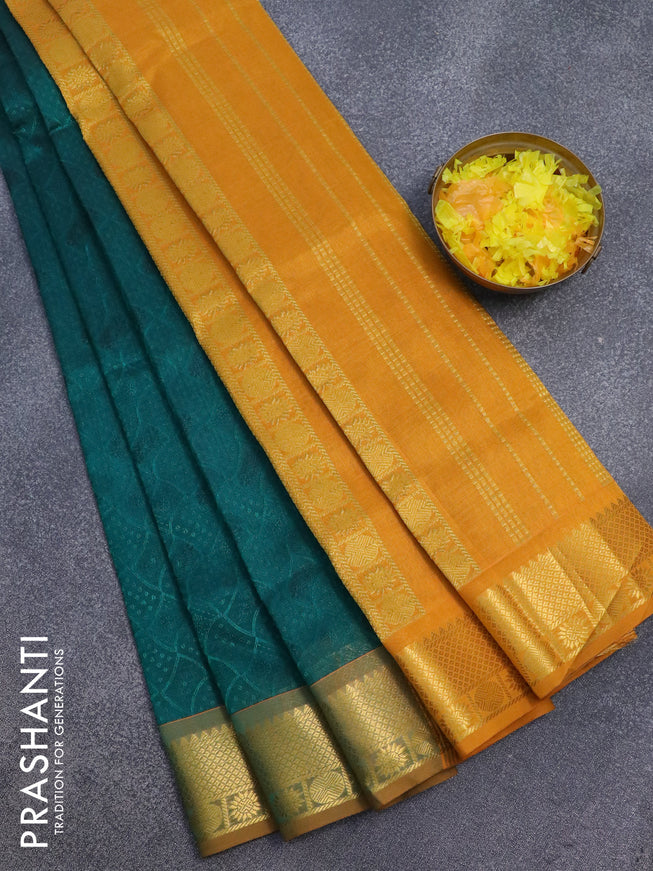 Silk cotton saree green and mustard yellow with allover self emboss jaquard and zari woven border