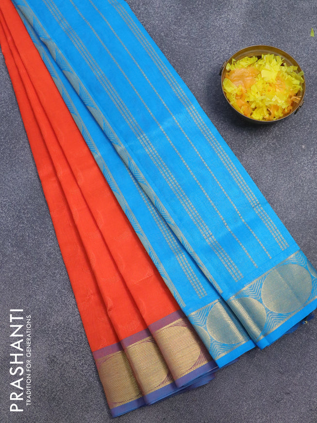 Silk cotton saree orange and cs blue with allover self emboss jaquard and rudhraksha zari woven border