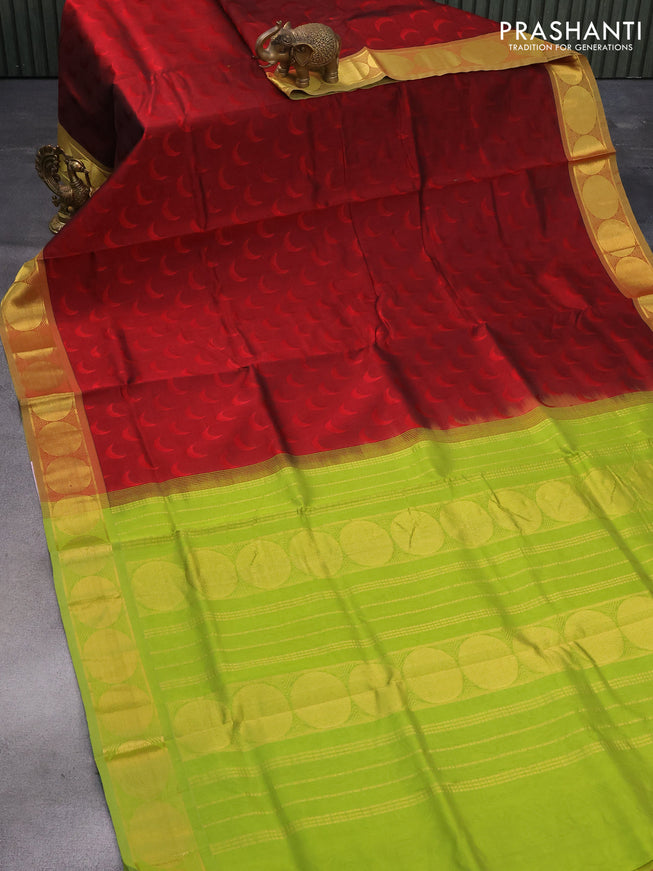 Silk cotton saree maroon and light green with allover self emboss jaquard and zari woven border