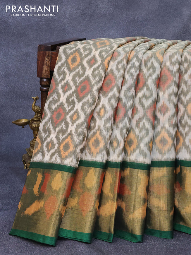 Ikat silk cotton saree beige and green with allover ikat weaves and long ikat woven zari border