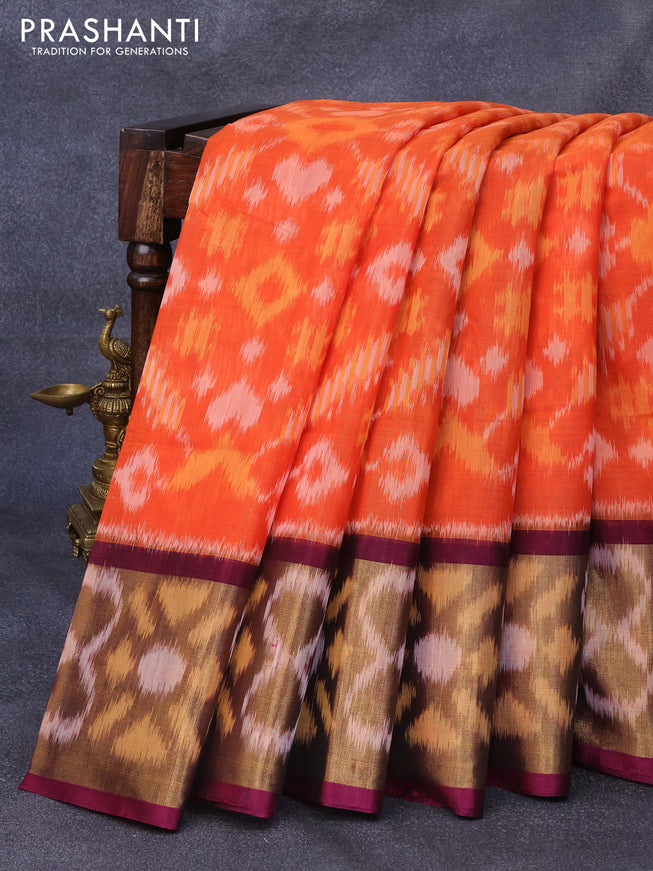 Ikat silk cotton saree orange and dark magenta pink with allover ikat weaves and long ikat woven zari border