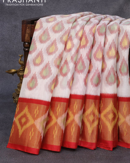 Ikat silk cotton saree off white and red with allover ikat butta weaves and long ikat woven zari border