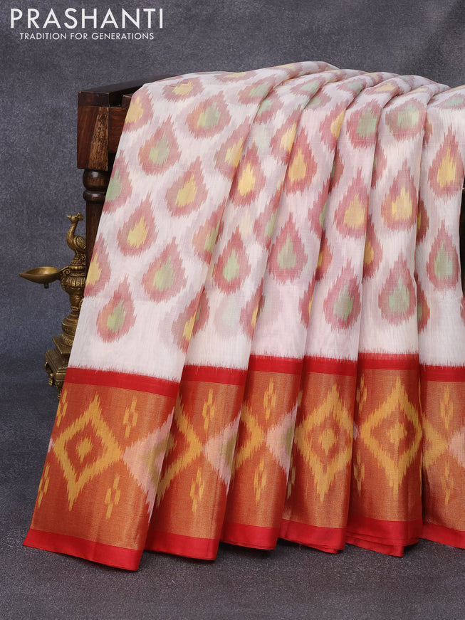 Ikat silk cotton saree off white and red with allover ikat butta weaves and long ikat woven zari border