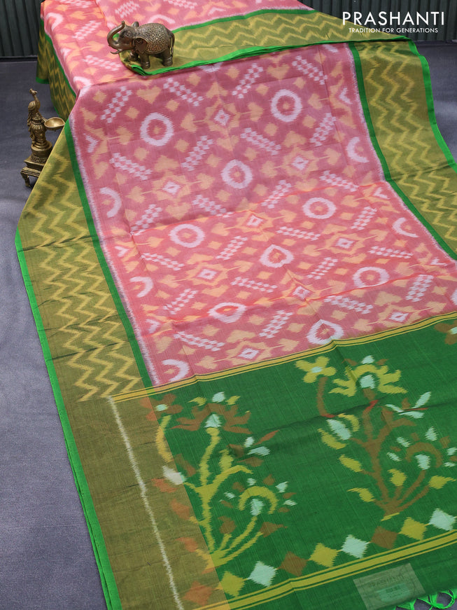 Ikat silk cotton saree peach pink and green with allover ikat weaves and long ikat woven zari border