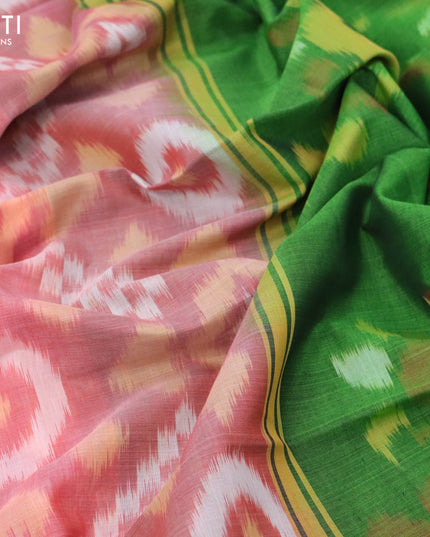Ikat silk cotton saree peach pink and green with allover ikat weaves and long ikat woven zari border
