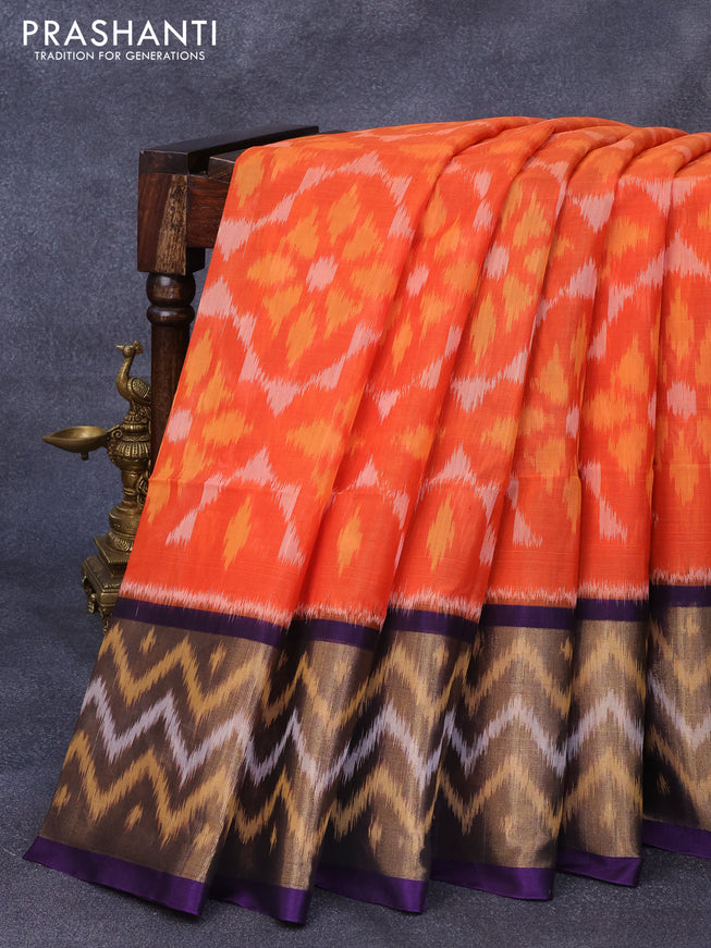 Ikat silk cotton saree orange and dark blue with allover ikat weaves and long ikat woven zari border