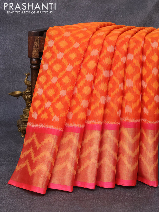 Ikat silk cotton saree rustic orange and peach pink with allover ikat weaves and long ikat woven zari border