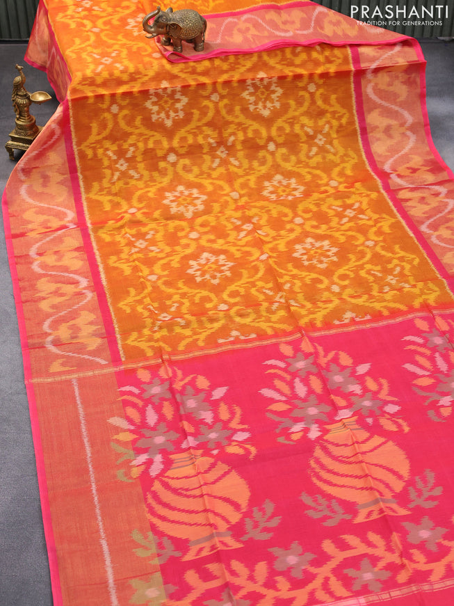 Ikat silk cotton saree dark mustard and peach pink with allover ikat weaves and long ikat woven zari border