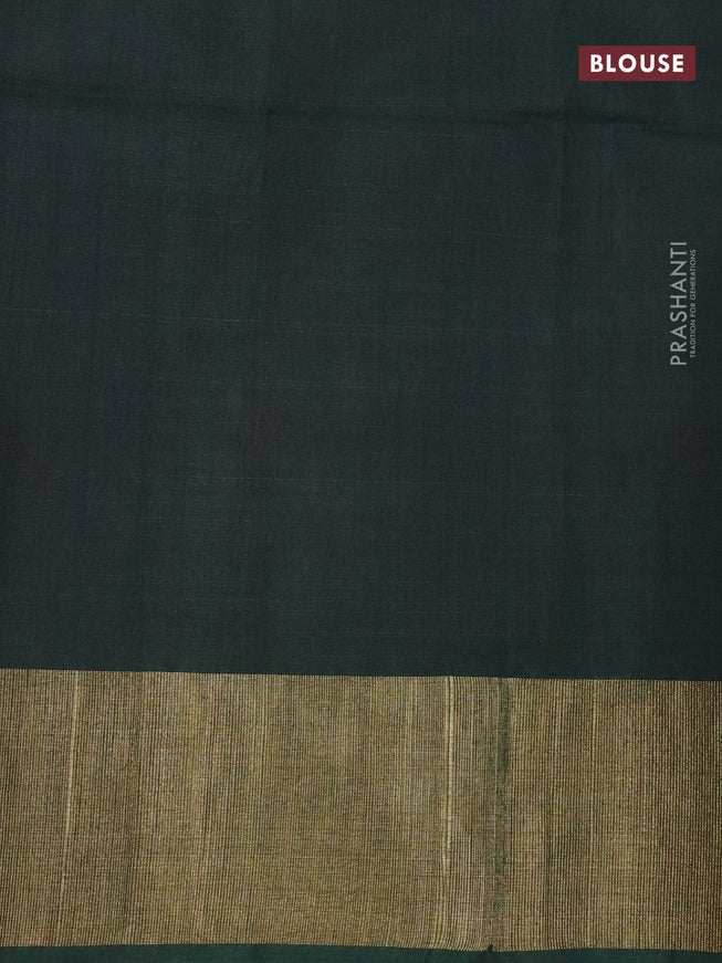 Ikat silk cotton saree otrange and dark green with allover ikat weaves and zari woven border