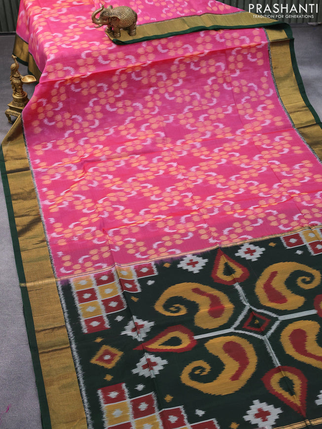 Ikat silk cotton saree magenta pink shade and bottle green with allover ikat weaves and zari woven border