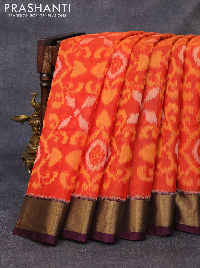 Ikat silk cotton saree orange and wine shade with allover ikat weaves and zari woven border