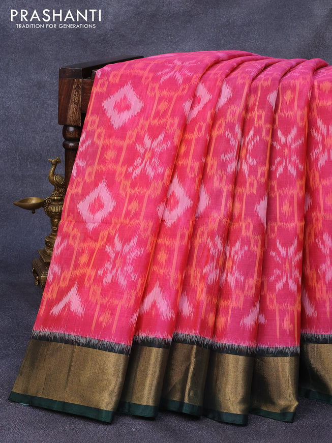 Ikat silk cotton saree pink and bottle green with allover ikat weaves and zari woven border
