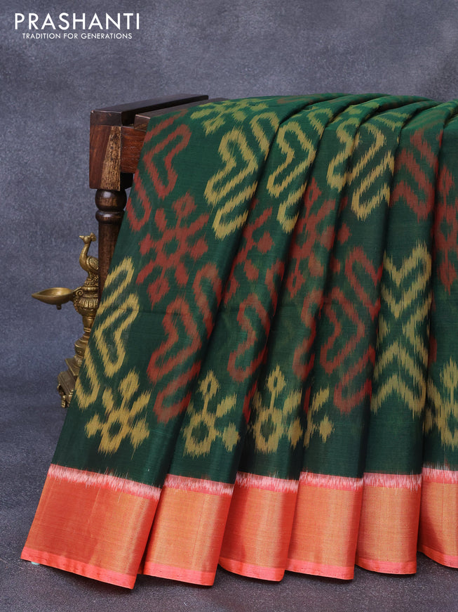 Ikat silk cotton saree bottle green and peach orange with allover ikat weaves and zari woven border