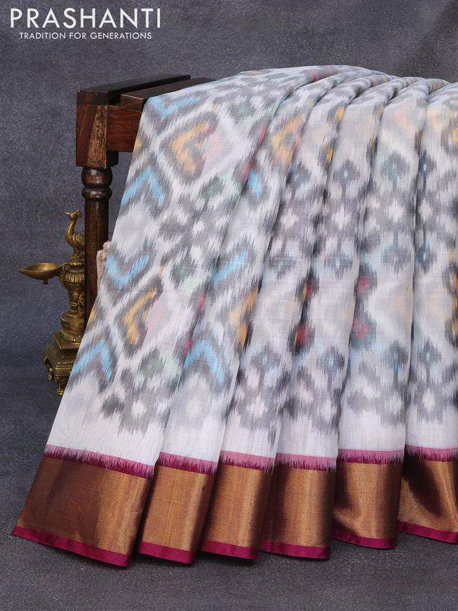 Ikat silk cotton saree off white and magenta pink with allover ikat weaves and zari woven border