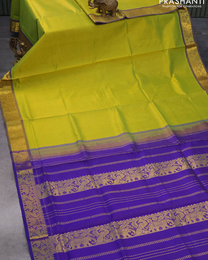 Silk cotton saree lime green and blue with allover vairosi pattern and peacock & elephant zari woven border