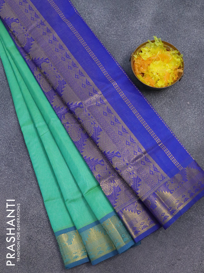 Silk cotton saree dual shade of tel bluish green and blue with allover vairosi pattern and annam & temple zari woven border