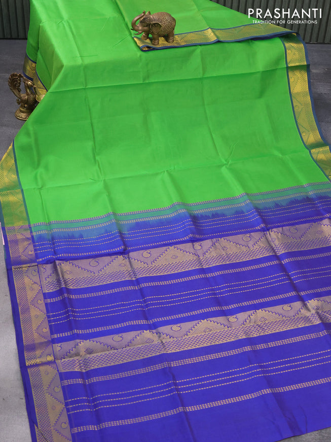Silk cotton saree parrot green and blue with allover vairosi pattern and zari woven border