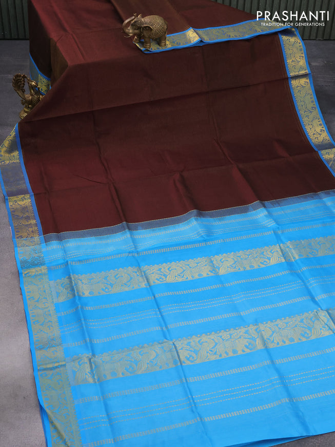 Silk cotton saree coffee brown and cs blue with allover vairosi pattern and peacock & elephant zari woven border