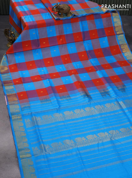 Silk cotton saree orange and cs blue with allover paalum pazhamum checks & zari buttas and annam zari woven border