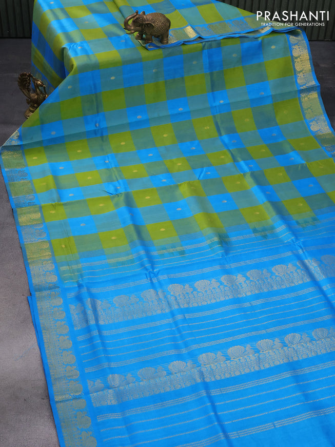 Silk cotton saree light green and cs blue with allover paalum pazhamum checks & zari buttas and annam zari woven border