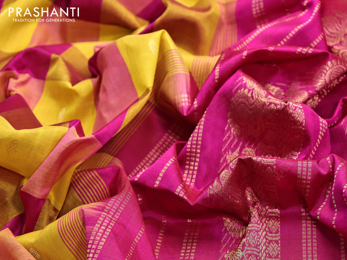 Silk cotton saree yellow and purple with allover paalum pazhamum checks & zari buttas and annam zari woven border