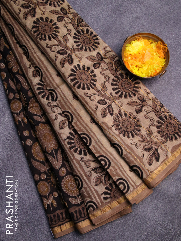 Chanderi bagru saree black and pastel brown shade with allover prints and zari woven piping border