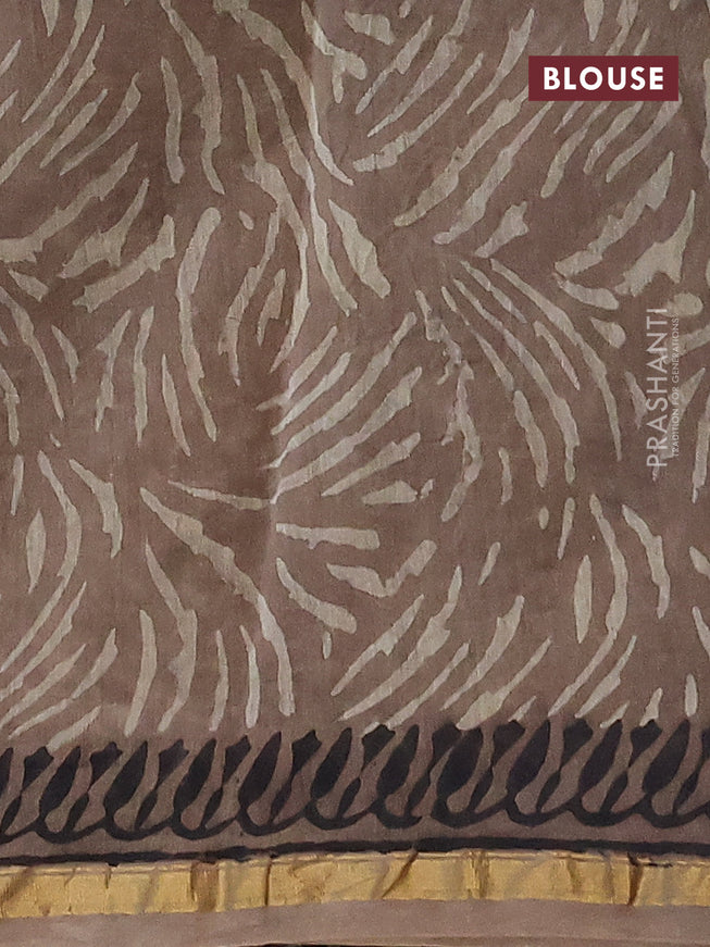 Chanderi bagru saree black and pastel brown shade with allover prints and zari woven piping border